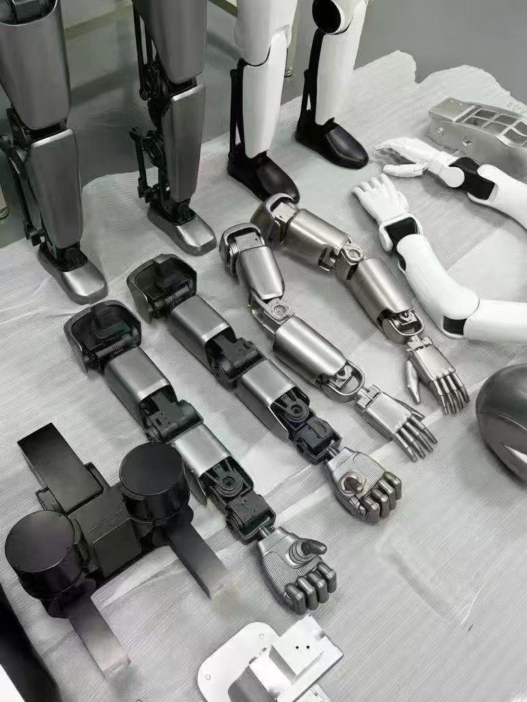Limb and joint assemblies staged for inspection at the production base